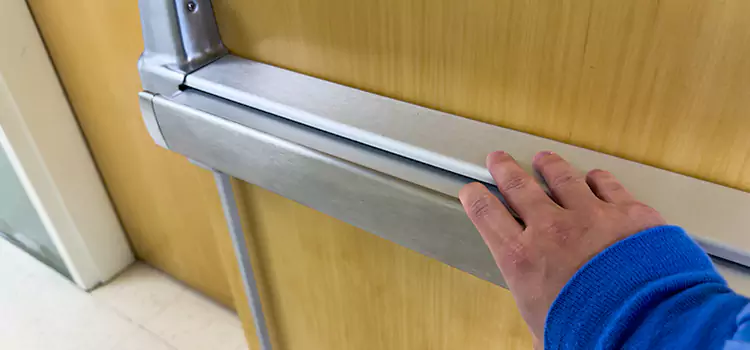 Installing a Push Bar on a Door Laguna Beach